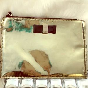 Used Victoria Secret Gold large make up bag